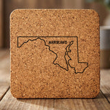 Maryland square cork coaster engraved with the state outline and MARYLAND in hand-drawn brush lettering