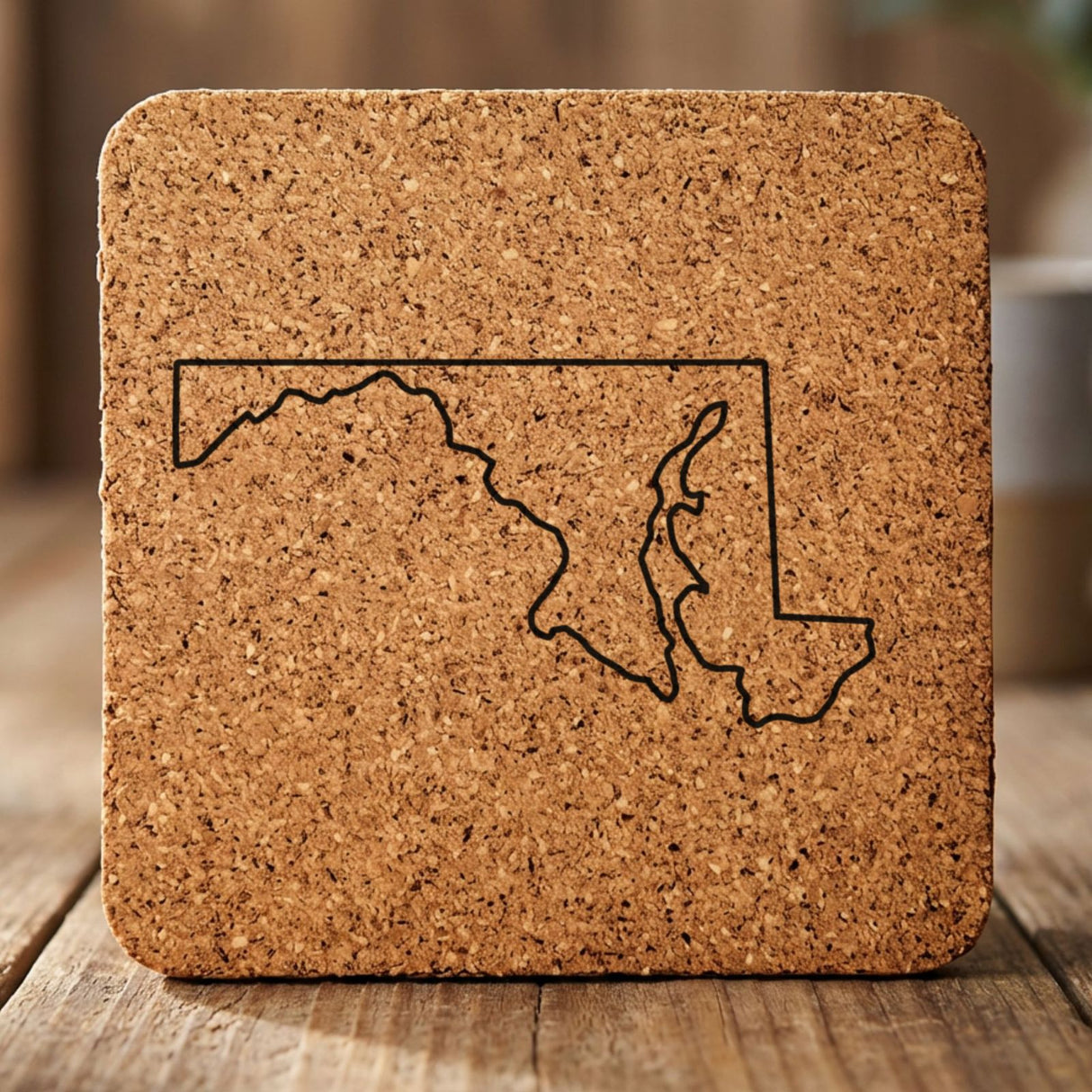 Maryland square cork coaster engraved with a clean state outline