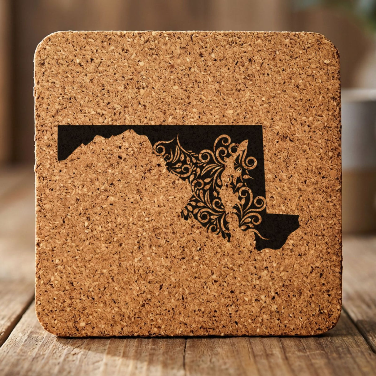 Maryland square cork coaster engraved with the state shape in ornate floral scrollwork
