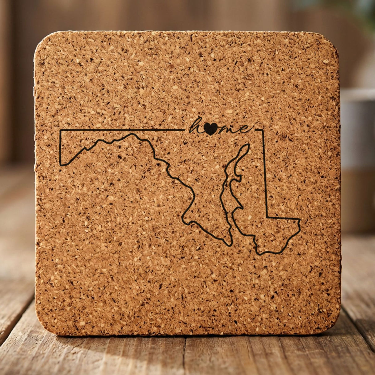 Maryland square cork coaster engraved with the state outline and home in script with a heart