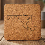 Maryland square cork coaster engraved with the state outline and home in script with a heart