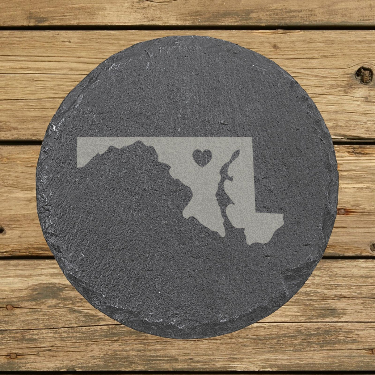 Maryland round slate coaster engraved with the state shape and a heart