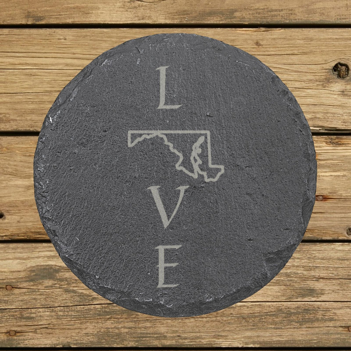 Maryland round slate coaster engraved with LOVE stacked vertically using the state as the letter O