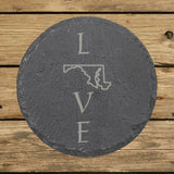 Maryland round slate coaster engraved with LOVE stacked vertically using the state as the letter O
