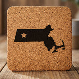 Massachusetts square cork coaster engraved with the state shape and a star