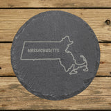 Massachusetts round slate coaster engraved with the state outline and MASSACHUSETTS in hand-drawn brush lettering