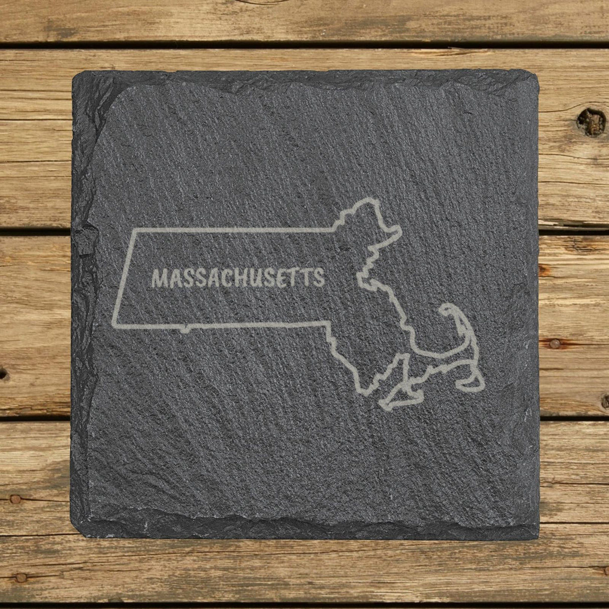 Massachusetts square slate coaster engraved with the state outline and MASSACHUSETTS in hand-drawn brush lettering