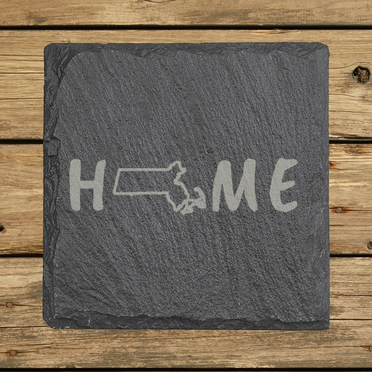 Massachusetts square slate coaster engraved with HOME using the state outline as the letter O