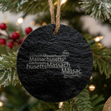 Massachusetts round slate Christmas ornament engraved with a word cloud of repeating Massachusetts text