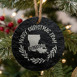 Round slate Christmas ornament engraved Merry Christmas From Louisiana, with the state shape in a laurel wreath
