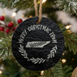 Round slate Christmas ornament engraved Merry Christmas From Tennessee, with the state shape in a laurel wreath