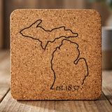 Michigan square cork coaster engraved with the state outline and est. 1837