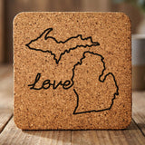 Michigan square cork coaster engraved with a hand-drawn state outline and love in cursive
