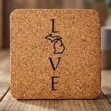 Michigan square cork coaster engraved with LOVE stacked vertically using the state as the letter O