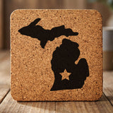 Michigan square cork coaster engraved with the state shape and a star