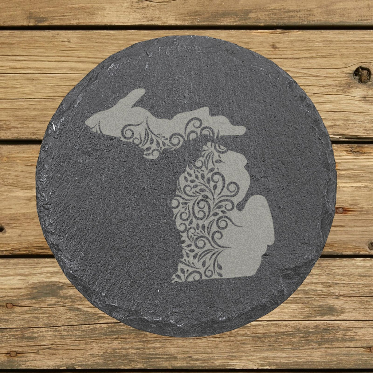 Michigan round slate coaster engraved with the state shape in ornate floral scrollwork
