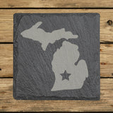 Michigan square slate coaster engraved with the state shape and a star