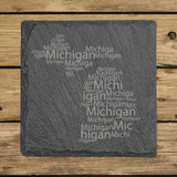 Michigan square slate coaster engraved with a word cloud of repeating Michigan text