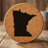 Minnesota round cork coaster with the full state shape engraved