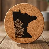Minnesota round cork coaster engraved with the state shape in ornate floral scrollwork