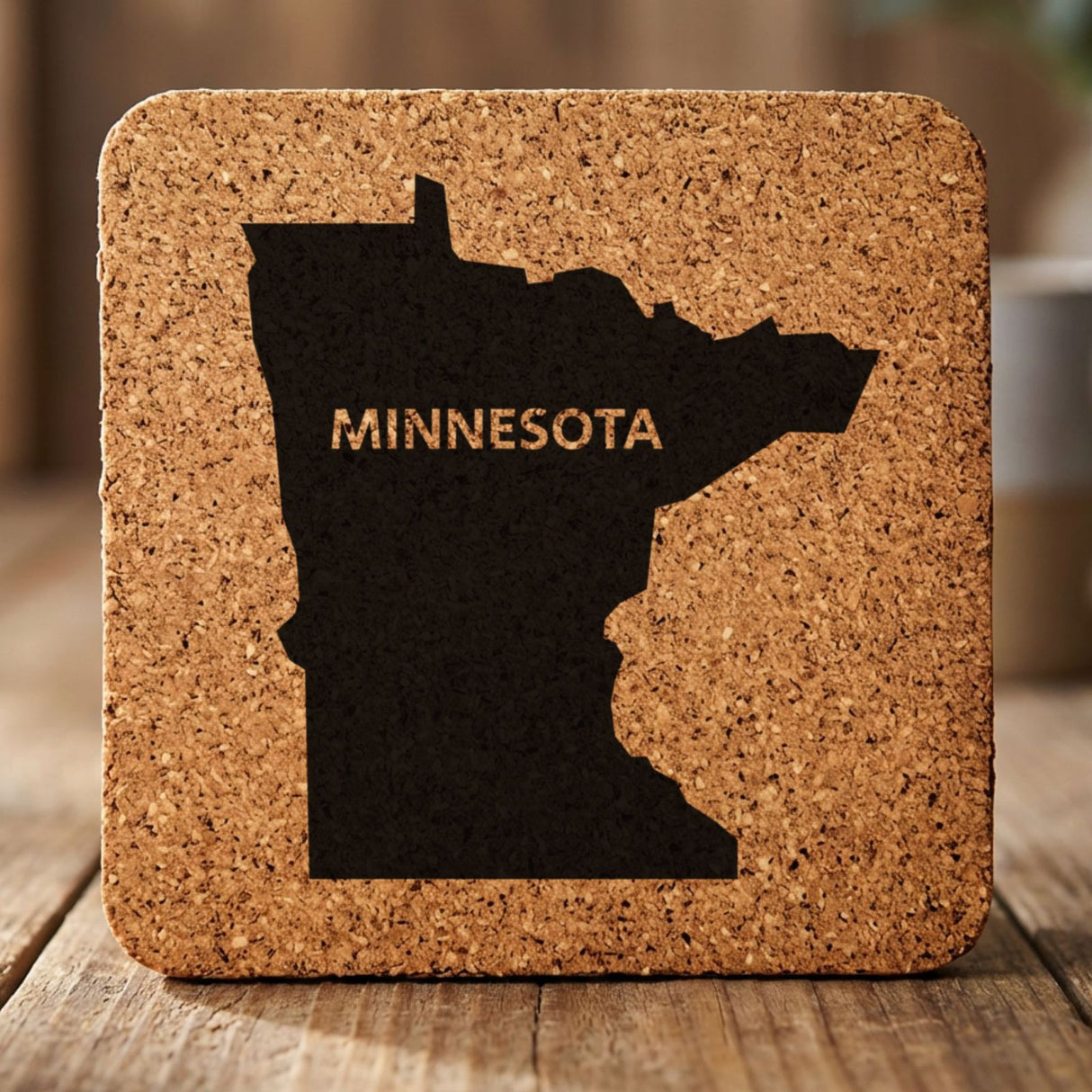 Minnesota square cork coaster engraved with the state shape and MINNESOTA in bold lettering