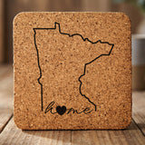 Minnesota square cork coaster engraved with the state outline and home in script with a heart