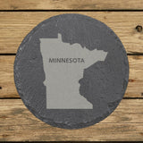 Minnesota round slate coaster engraved with the state shape and MINNESOTA in bold lettering