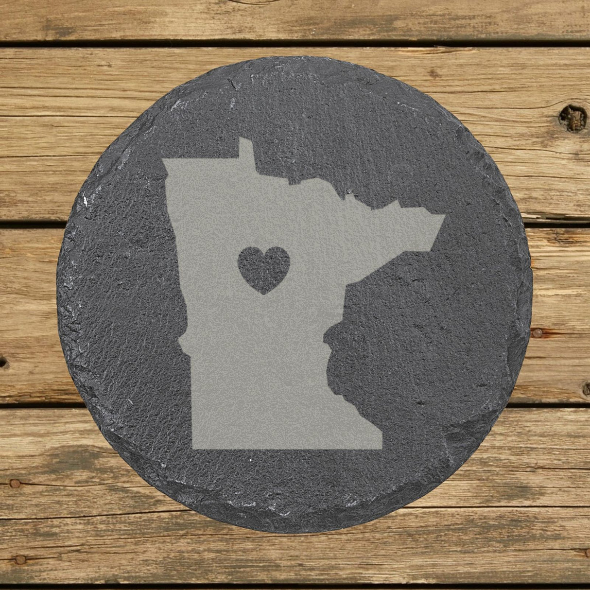 Minnesota round slate coaster engraved with the state shape and a heart