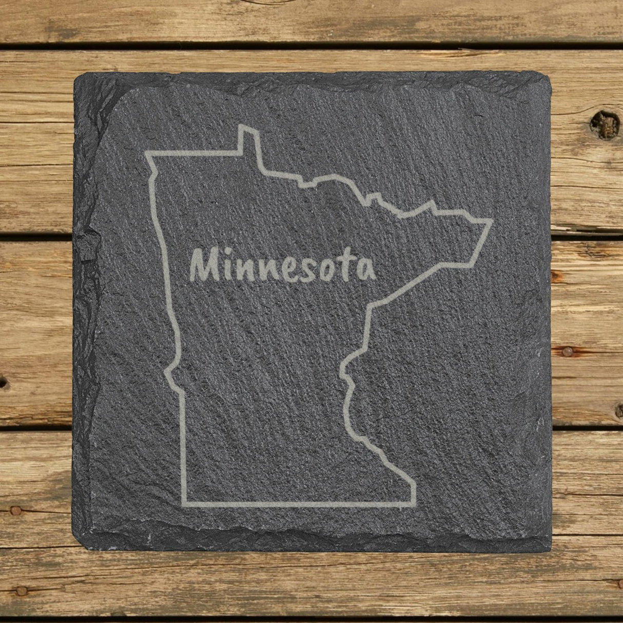 Minnesota square slate coaster engraved with the state outline and MINNESOTA in hand-drawn brush lettering