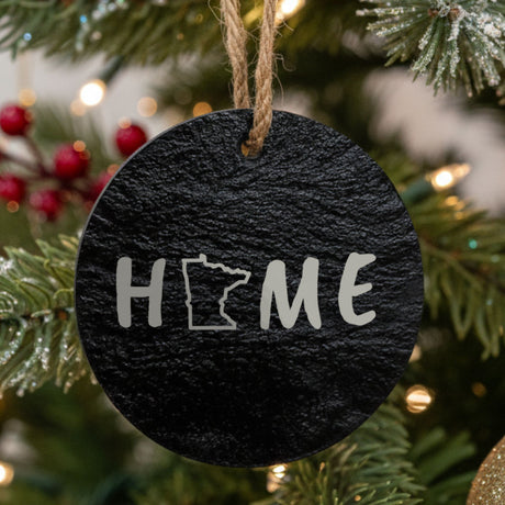 Minnesota round slate Christmas ornament engraved with HOME using the state outline as the letter O