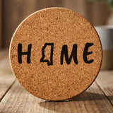 Mississippi round cork coaster engraved with HOME using the state outline as the letter O