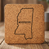 Mississippi square cork coaster engraved with the state outline and MISSISSIPPI in hand-drawn brush lettering