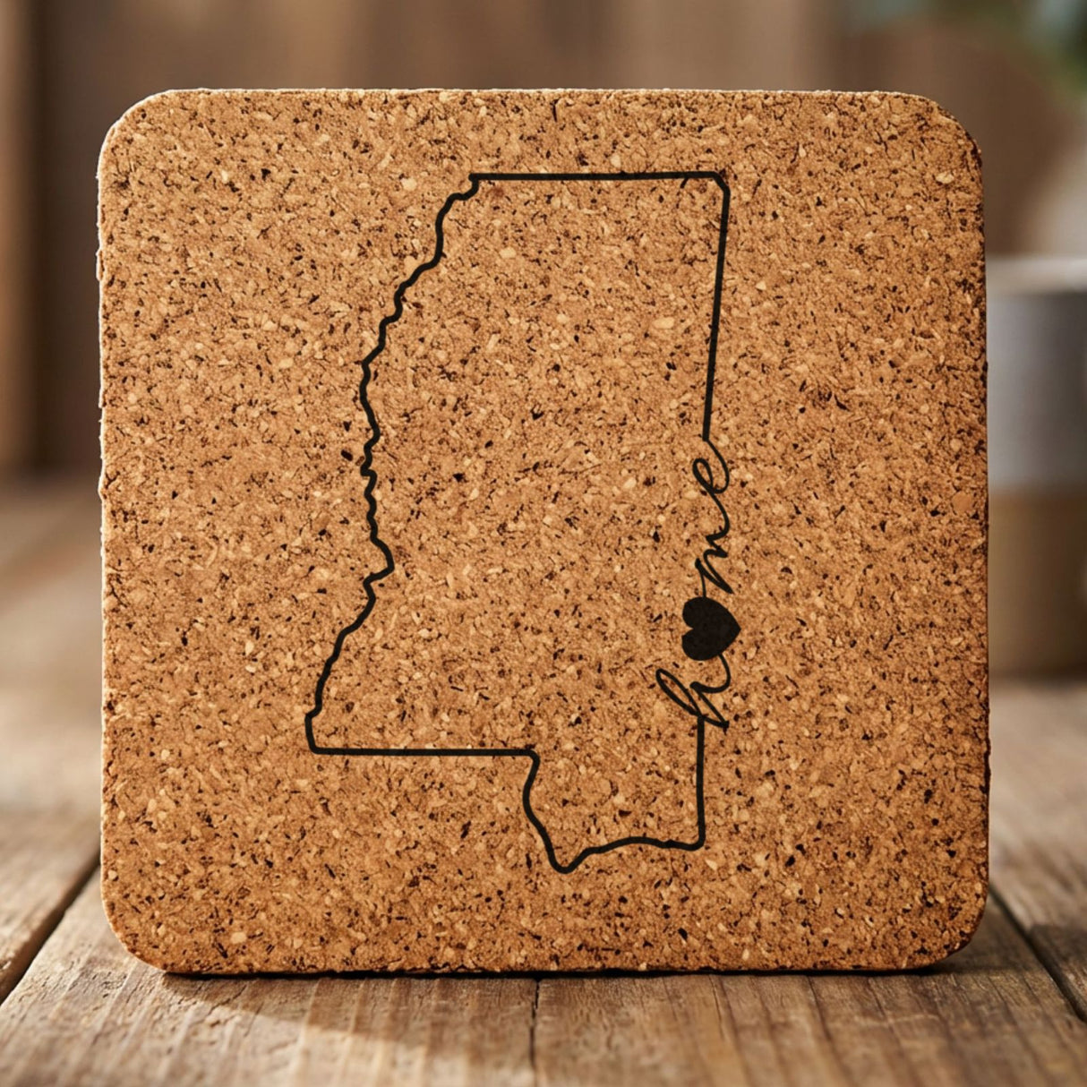 Mississippi square cork coaster engraved with the state outline and home in script with a heart