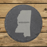 Mississippi round slate coaster engraved with the state shape and MISSISSIPPI in bold lettering