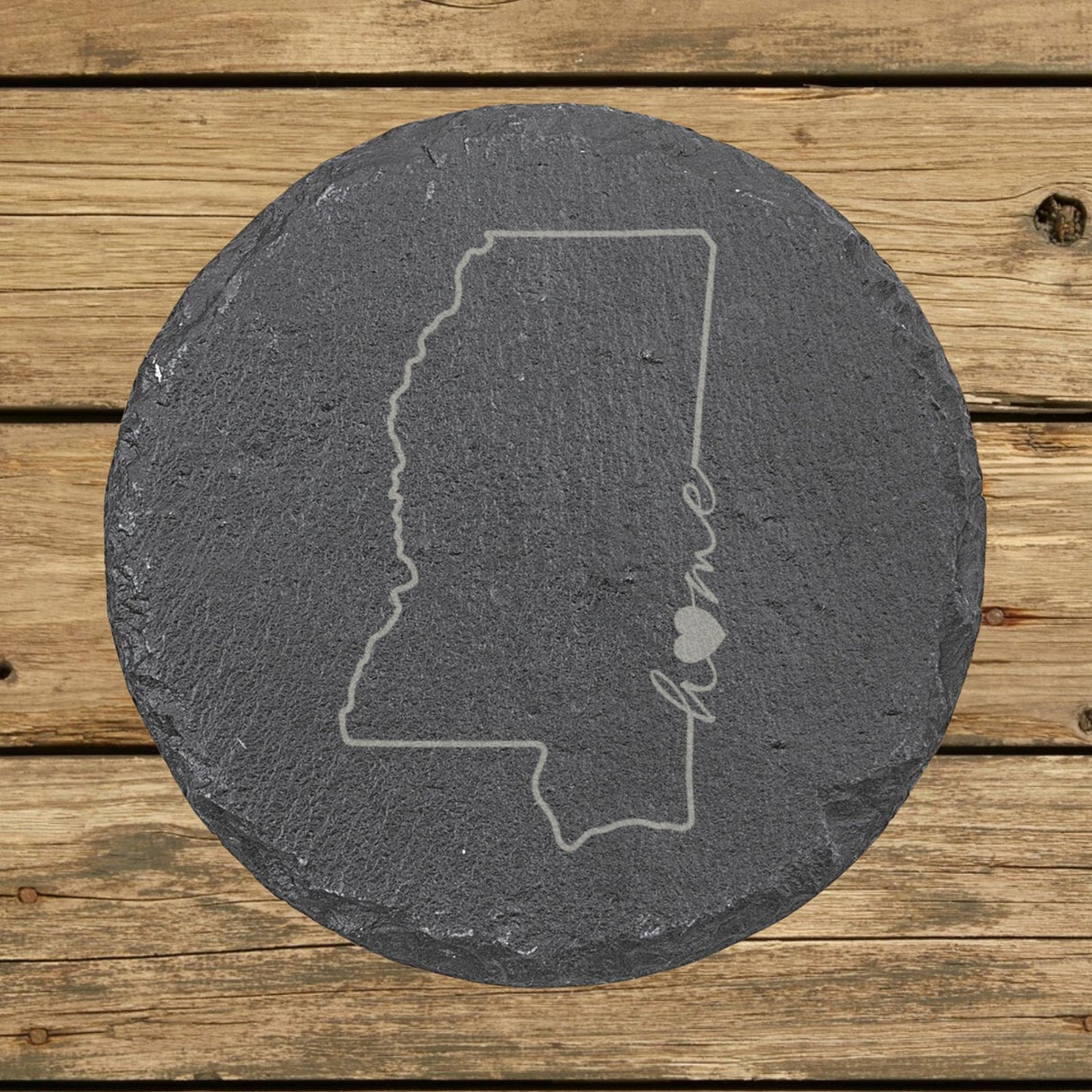 Mississippi round slate coaster engraved with the state outline and home in script with a heart