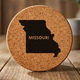 Missouri round cork coaster engraved with the state shape and MISSOURI in bold lettering