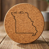 Missouri round cork coaster engraved with the state outline and est. 1821