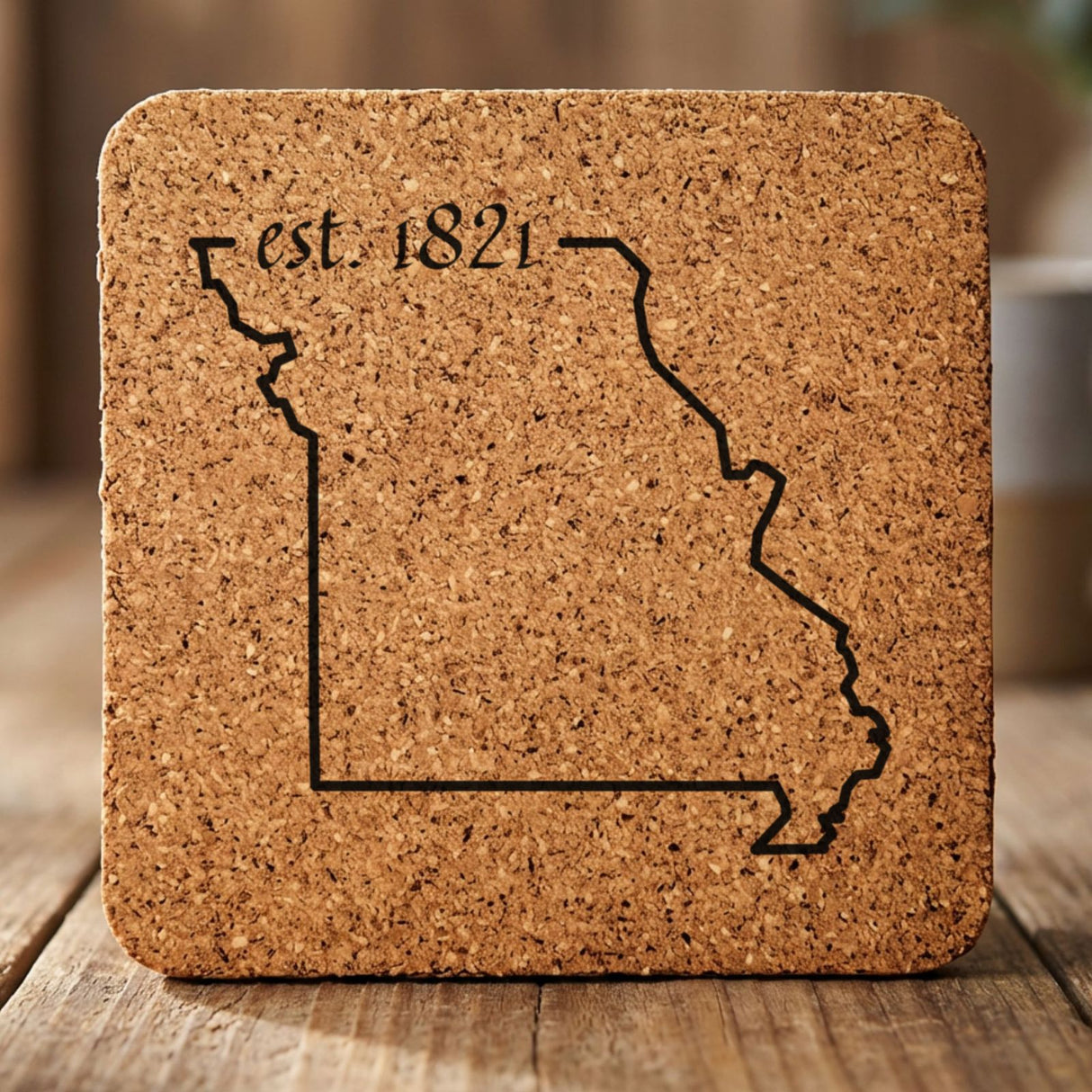 Missouri square cork coaster engraved with the state outline and est. 1821