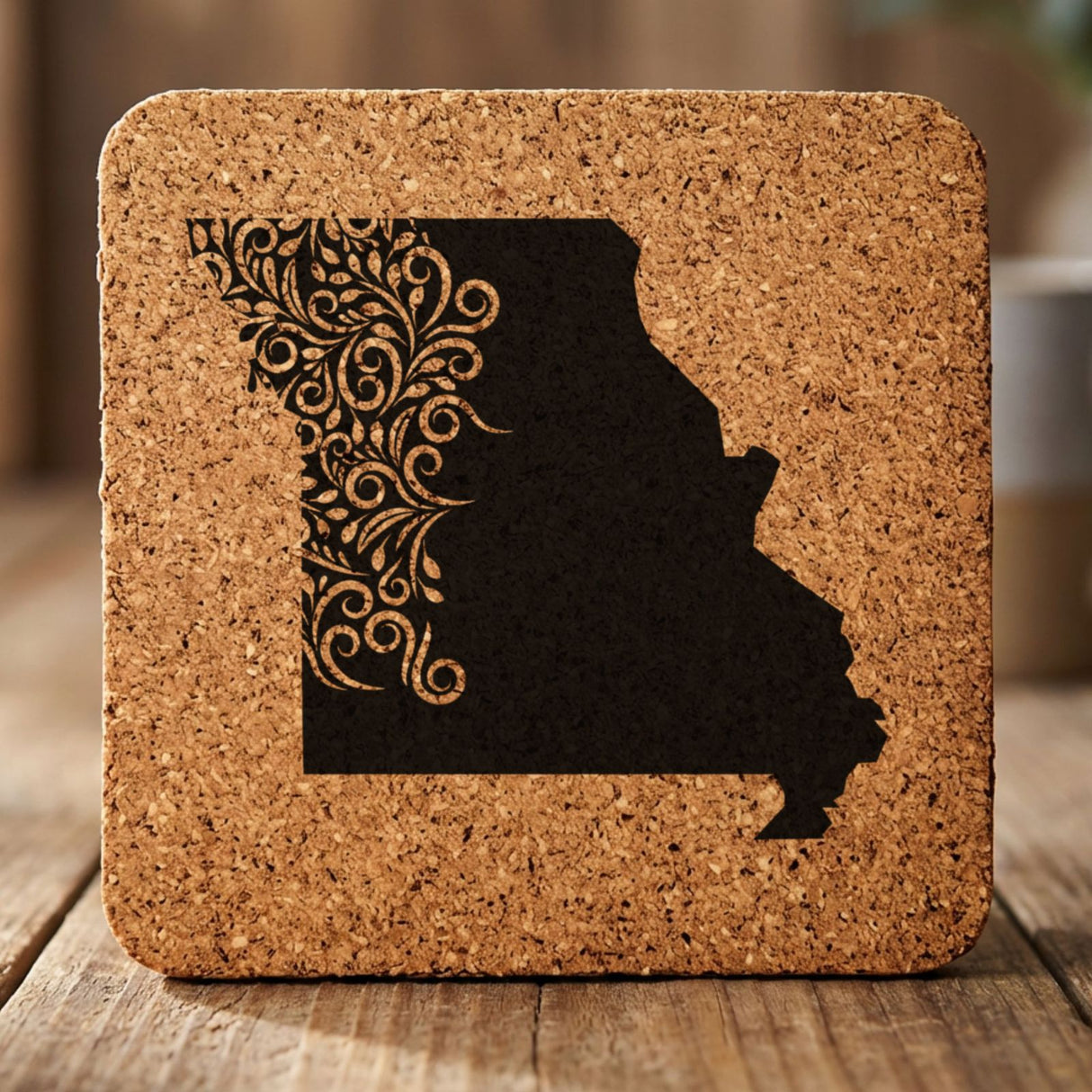 Missouri square cork coaster engraved with the state shape in ornate floral scrollwork