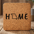 Missouri square cork coaster engraved with HOME using the state outline as the letter O