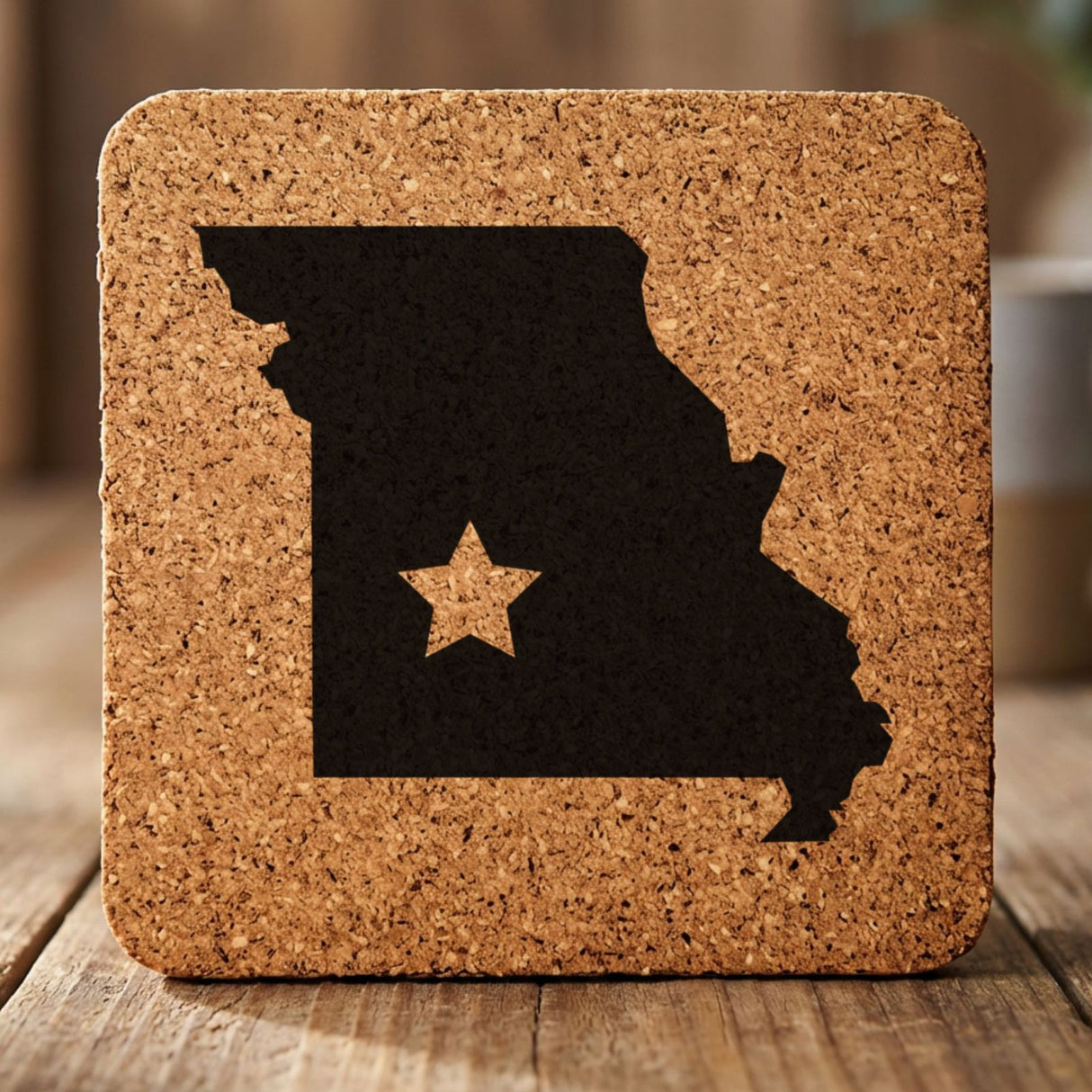 Missouri square cork coaster engraved with the state shape and a star