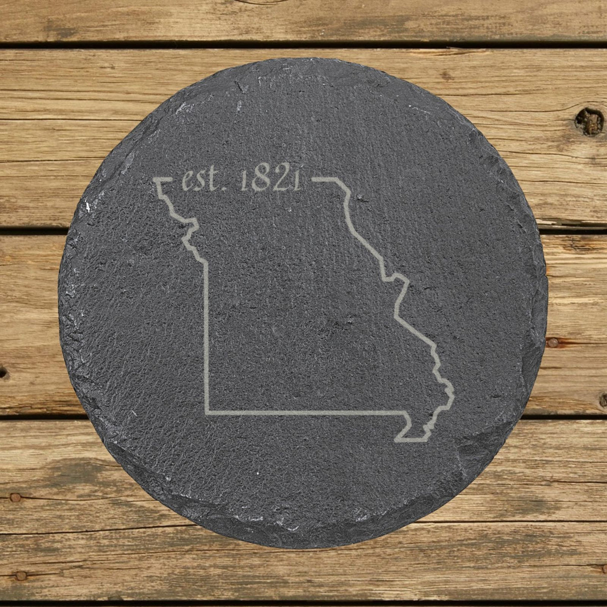 Missouri round slate coaster engraved with the state outline and est. 1821