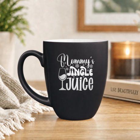 16 oz black ceramic coffee mug with "Mommy's Jingle Juice"