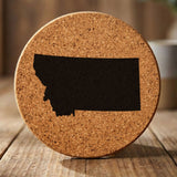 Montana round cork coaster with the full state shape engraved