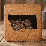 Montana square cork coaster engraved with the state shape in ornate floral scrollwork
