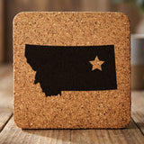 Montana square cork coaster engraved with the state shape and a star
