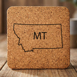 Montana square cork coaster engraved with the state outline and MT initials