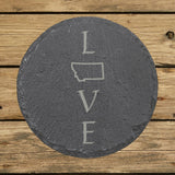 Montana round slate coaster engraved with LOVE stacked vertically using the state as the letter O