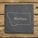 Montana square slate coaster engraved with the state outline and MONTANA in hand-drawn brush lettering