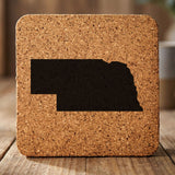Nebraska square cork coaster with the full state shape engraved